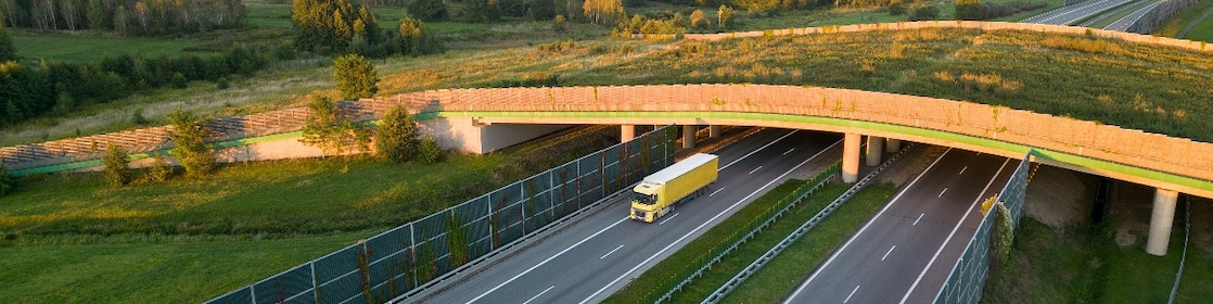 truck driving down highway