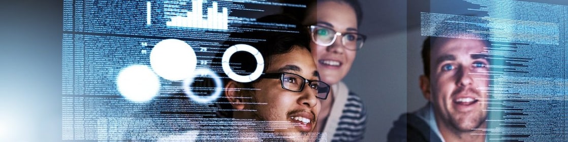 A group of experts analyse code and data on a screen