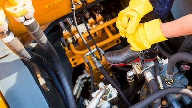 Technician working on equipment