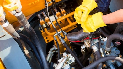 Technician working on equipment