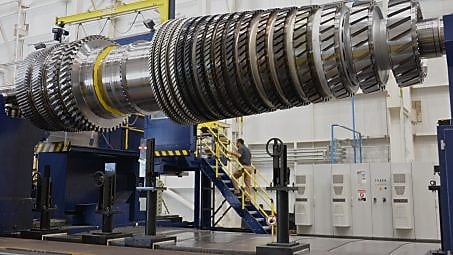 Turbine image with person in background