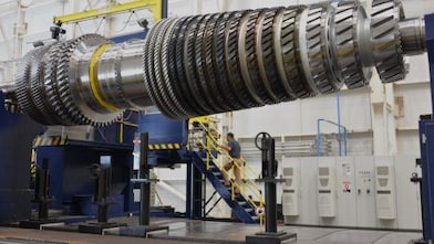Turbine image with person in background