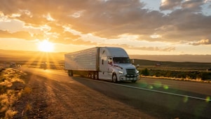 truck travelling during sunset