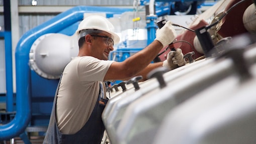 Engineer working on engine