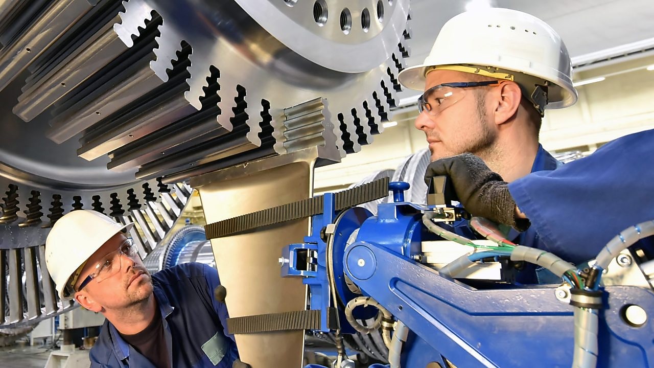 Digger and dump truck in a mine