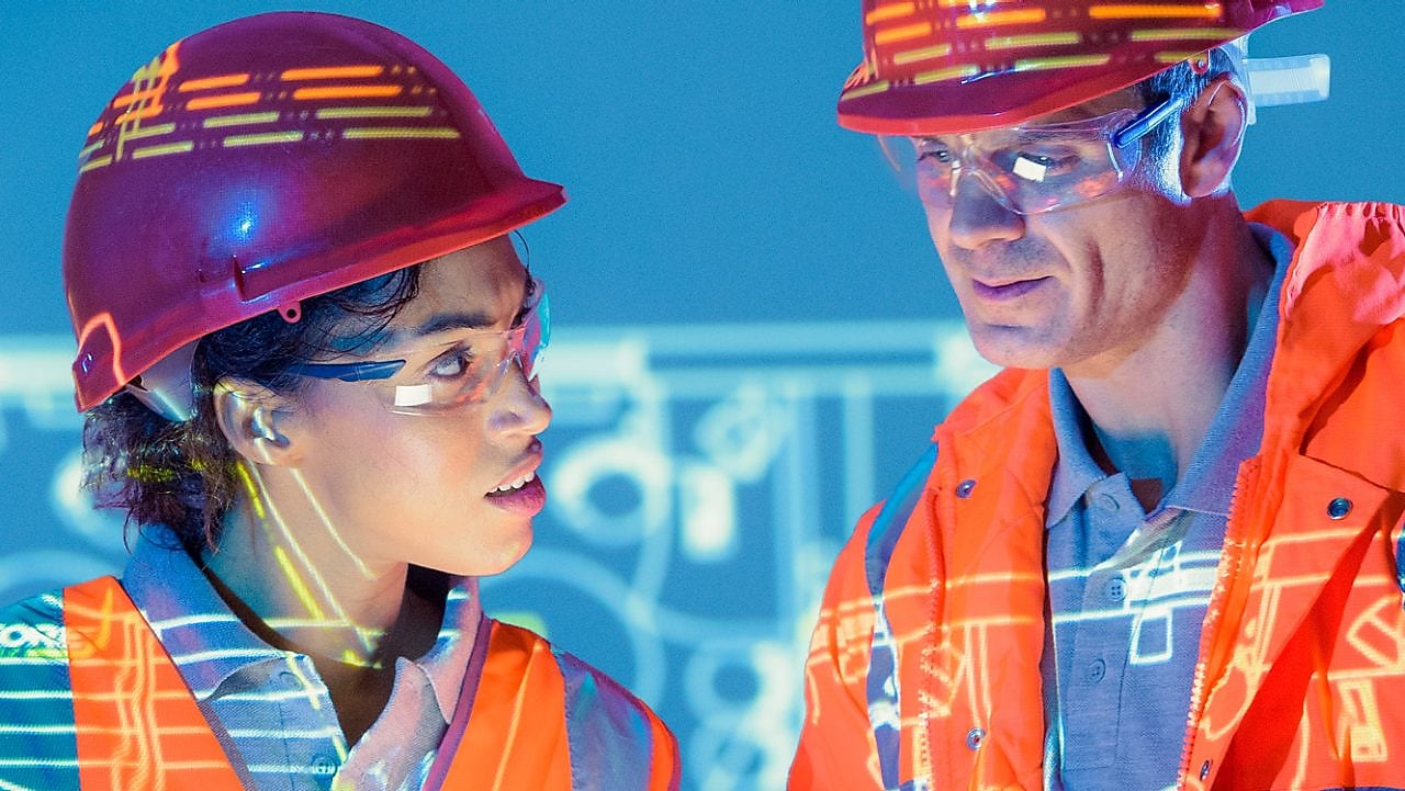 Shell Construction workers and drawing sheets