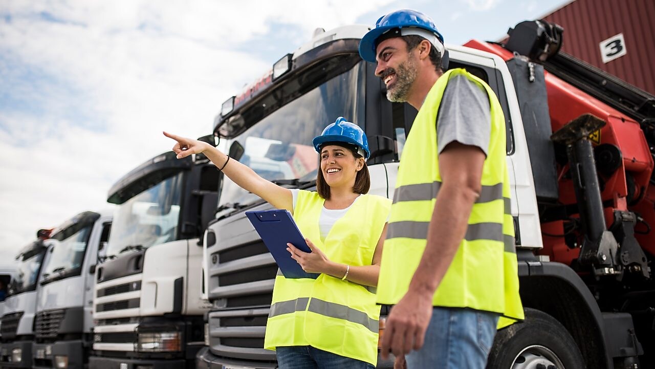 Employee explaining to other employee