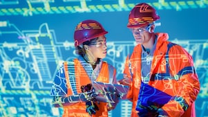 Shell Construction workers and drawing sheets