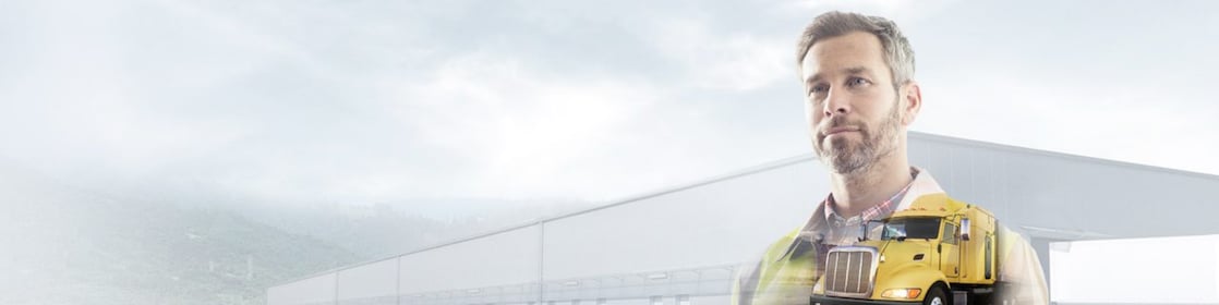 man reading a document transposed onto a background of a site and yellow truck
