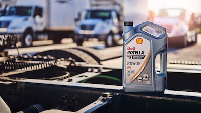 Motor oil container on truck engine