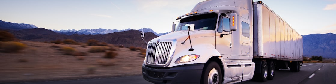 Commercial semi-truck traveling on a highway