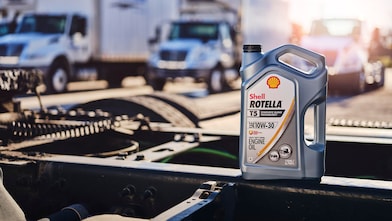 Motor oil container on truck engine