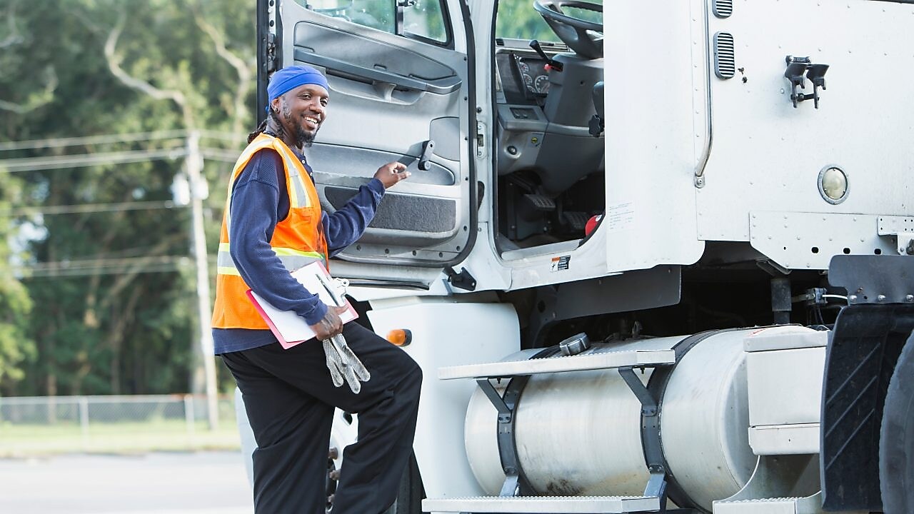 Maintenance manager surveying truck