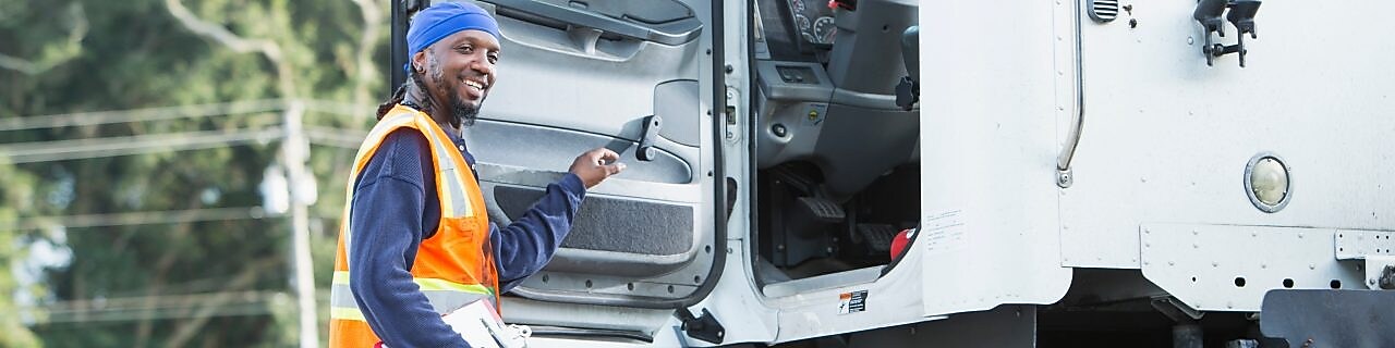 Maintenance manager surveying truck