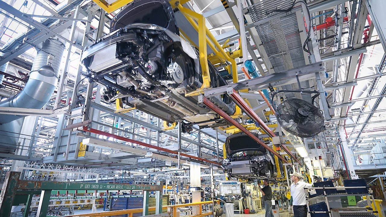 Factory workers in auto components plant