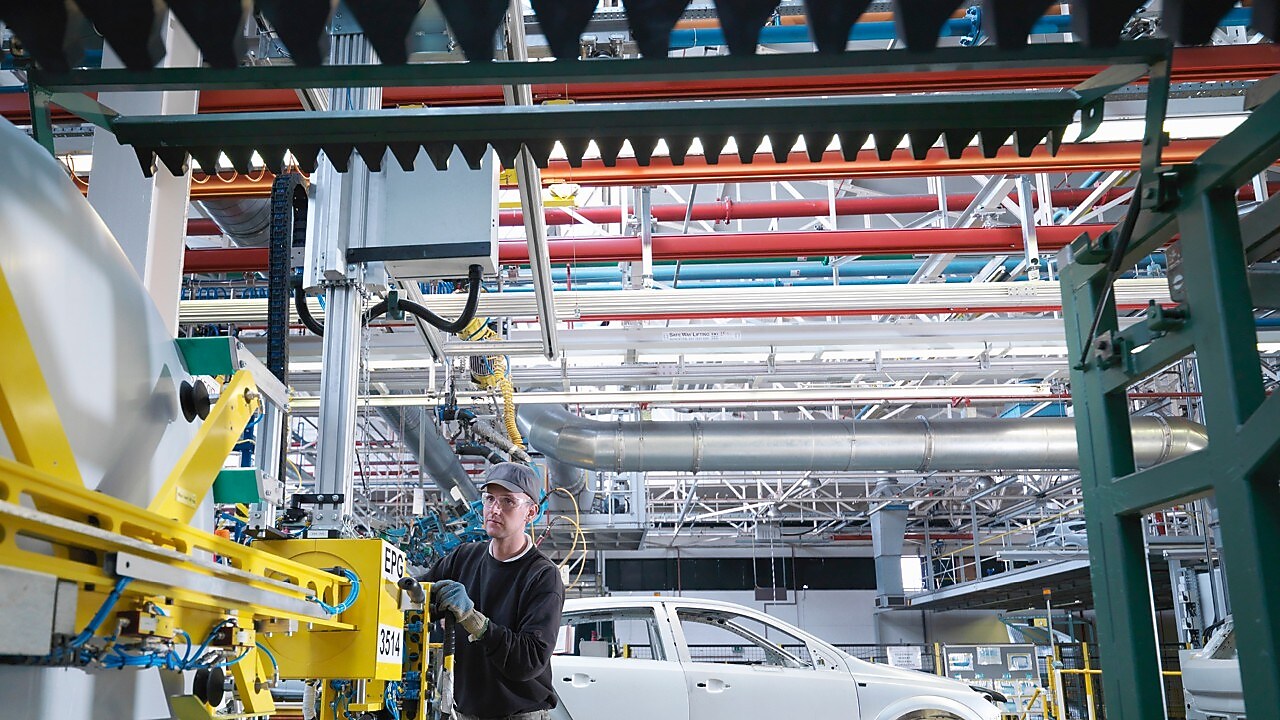 Factory workers in auto components plant
