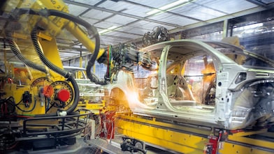 Factory workers in auto components plant