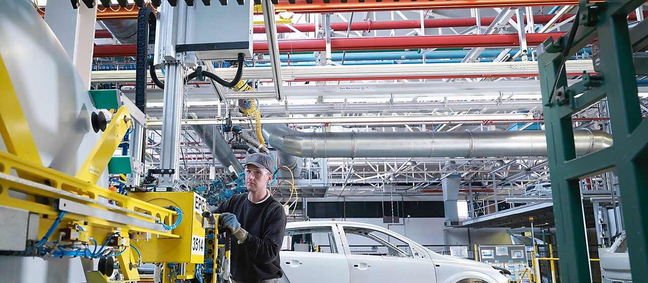 Factory workers in auto components plant