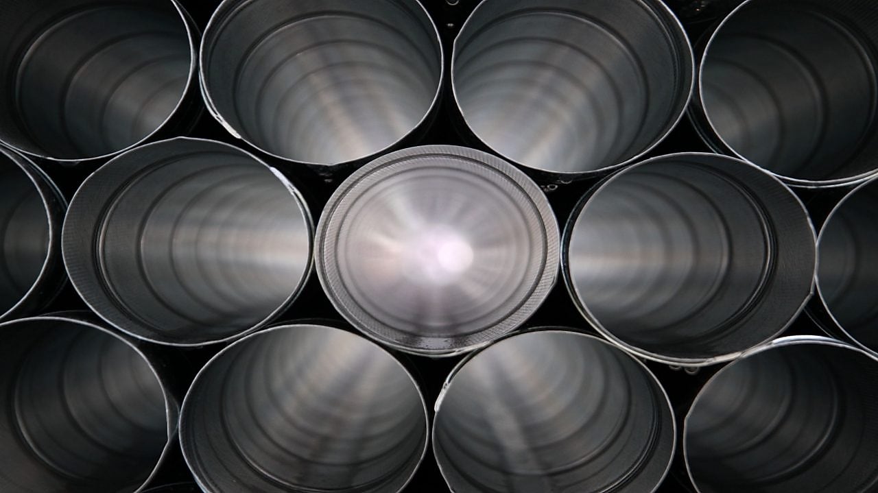 steel tubes stacked on top of each other