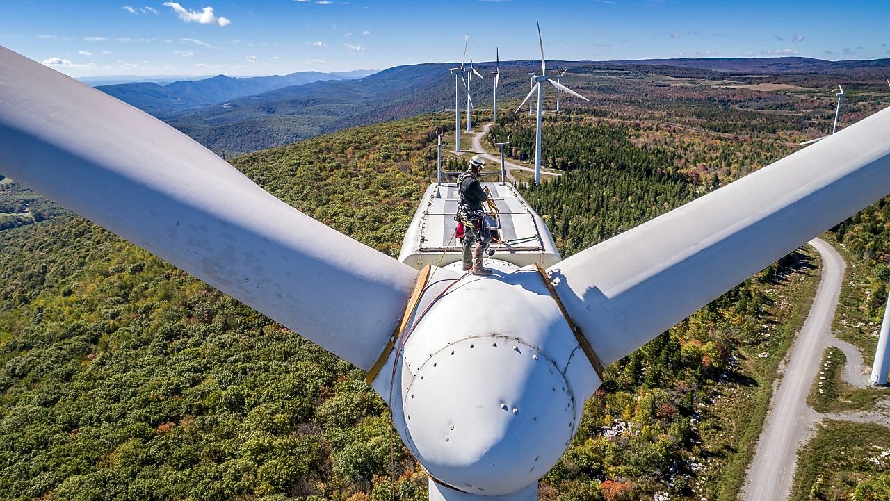A maintenance crew member working at height at Mount Storm Wind Turbine.