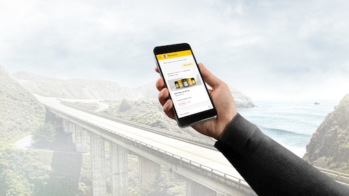 man holding a phone in his hand