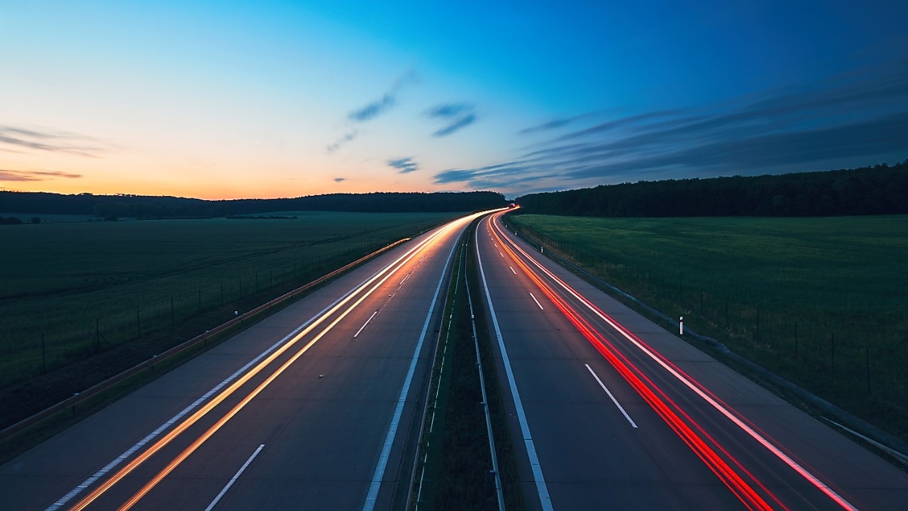A highway with light trailsA highway with light trails