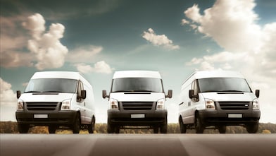 A row of white vans