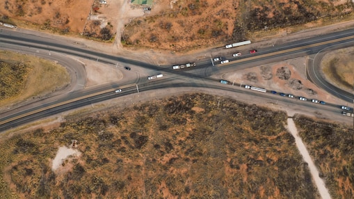 Cars driving on highway in Permian Basin, West Texas
