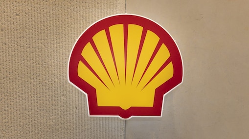 Shell logo displayed on a wall background.