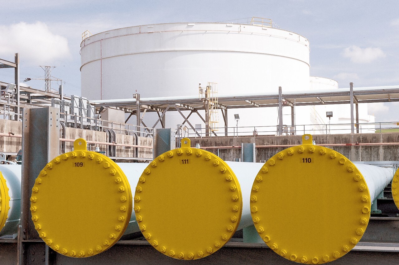 Yellow pipes aligned side by side