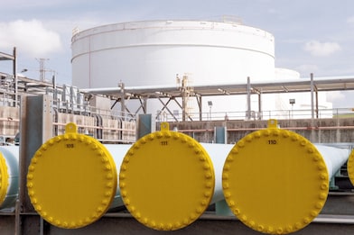 Yellow pipes aligned side by side