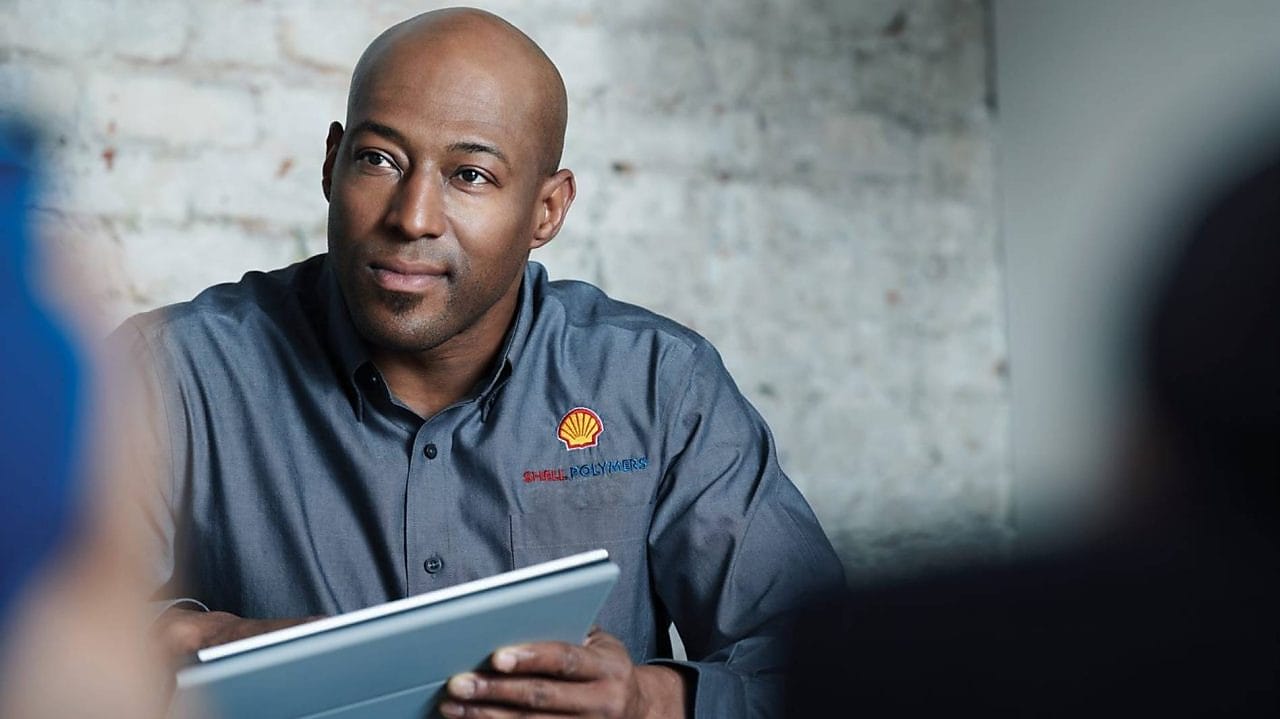 Shell Polymers employee listening to potential contractor