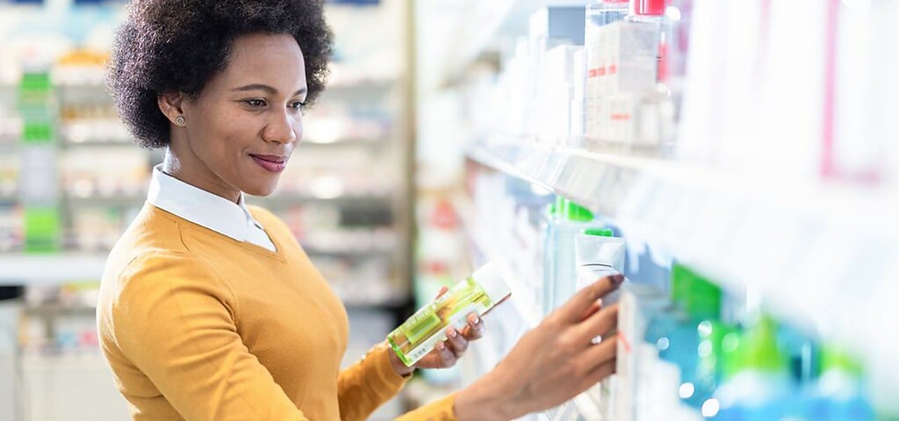 Woman at grocery store shelves