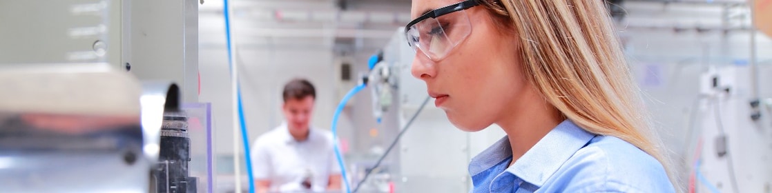 Women workin inside plastics suppliers lab