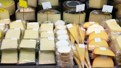 A shelf of bulk cheese using lldpe plastic film wrap