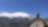 Elliot Carnevale standing on top of a mountain looking out