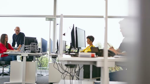 Employees are discussing on supply chain challenges