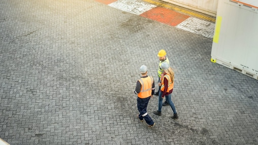 three people walking talking