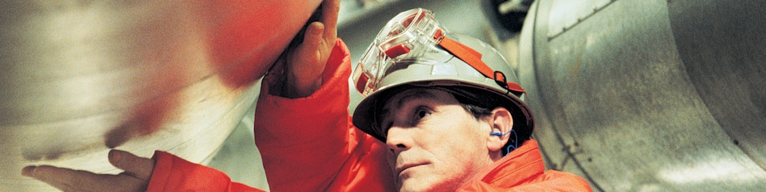 polyethylene plant worker inspects plant operations