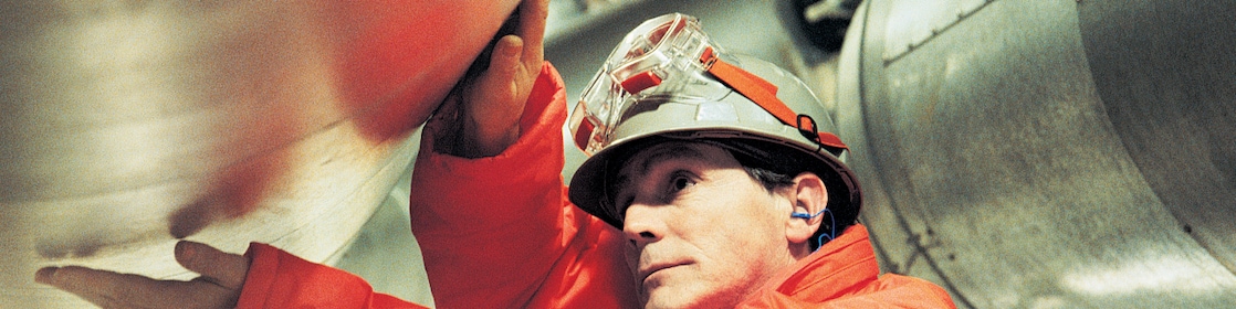 polyethylene plant worker inspects plant operations