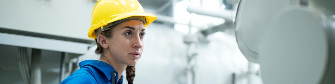 polymer plant expert examines equipment