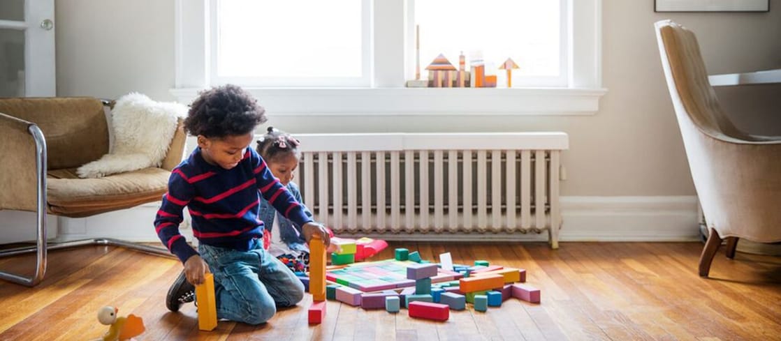 Children playing with plastic toys 