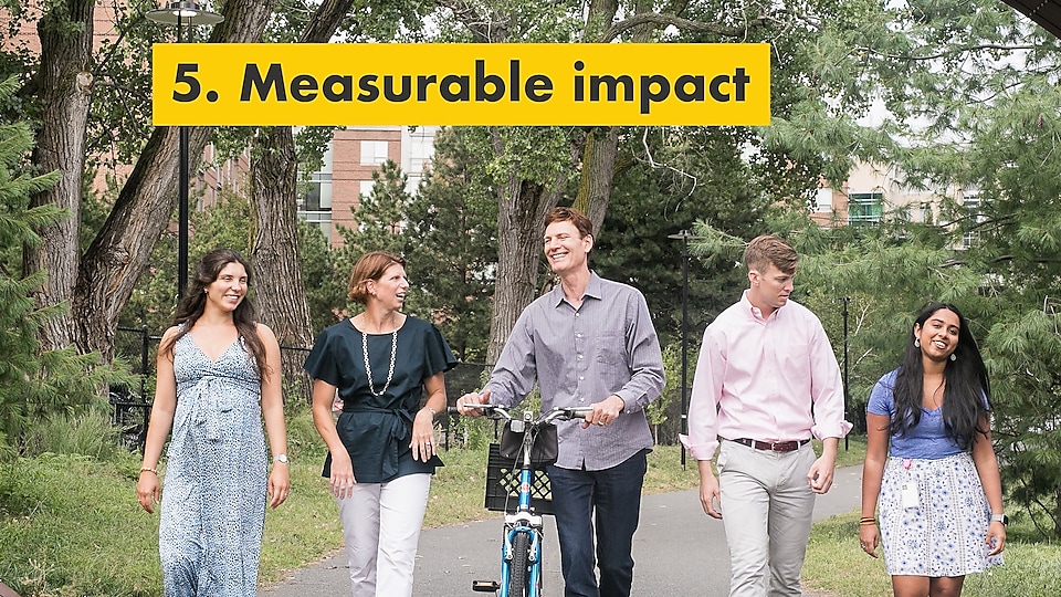 Reason number five – measurable impact. Julie Ferland and Shell TechWorks team taking a walk outdoors.
