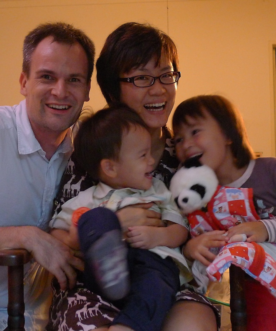 Shell employee Joyce Loh with her husband and two kids.