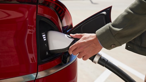 red ev in a charger