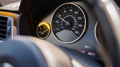 Black car gas gauge with fuel gauge full
