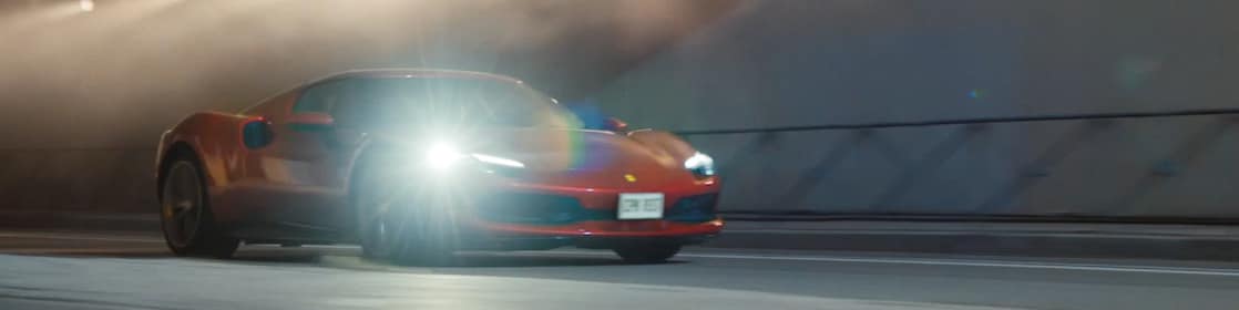 A red car in a tunnel