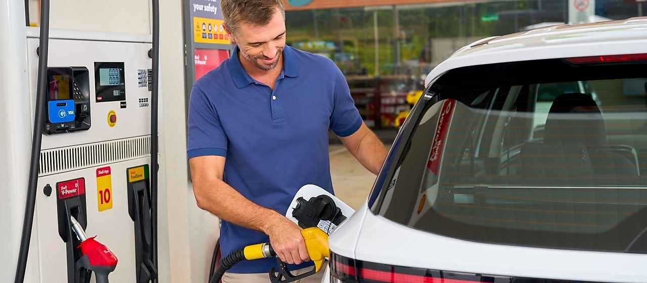 Man filling up at Fuel Rewards Station