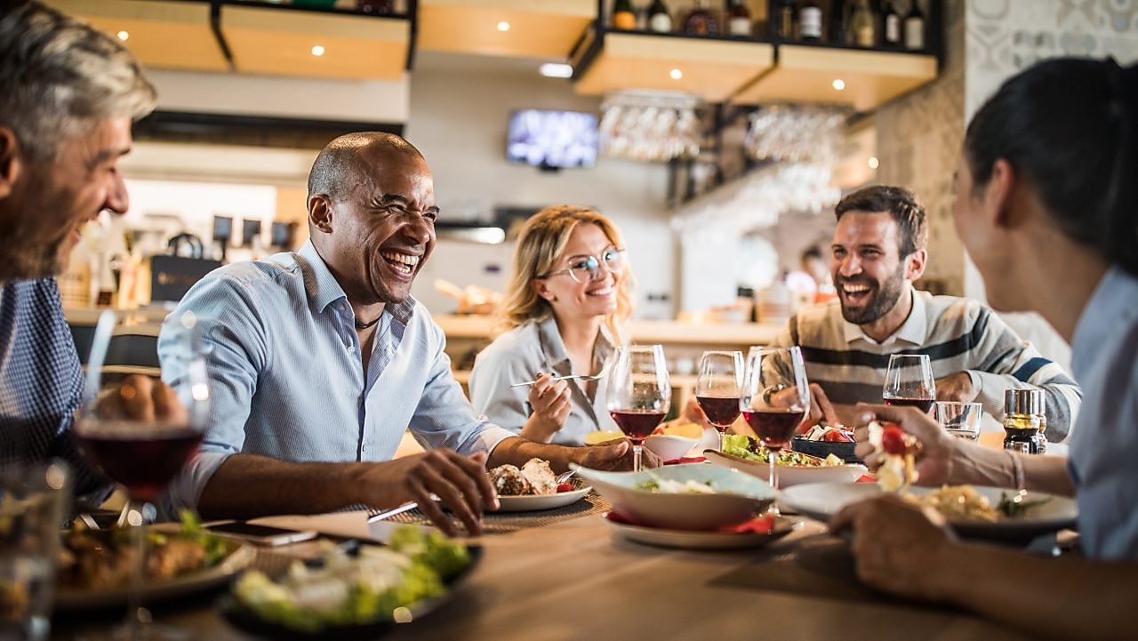Woman using digital tablet at the cafe