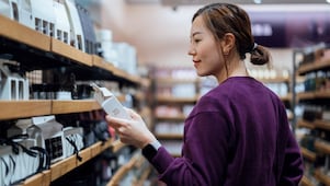 Customer seen shopping for personal skincare products in a shop.